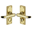 This is an image of a Heritage Brass - Door Handle for Privacy Set Windsor Short Design Polished Brass Fin, v735-pb that is available to order from T.H Wiggans Ironmongery in Kendal.