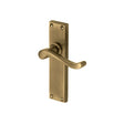 This is an image of a Heritage Brass - Door Handle Lever Latch Bedford Design Antique Brass Finish, v803-at that is available to order from T.H Wiggans Ironmongery in Kendal.