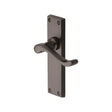 This is an image of a Heritage Brass - Door Handle Lever Latch Bedford Design Matt Bronze Finish, v803-mb that is available to order from T.H Wiggans Ironmongery in Kendal.