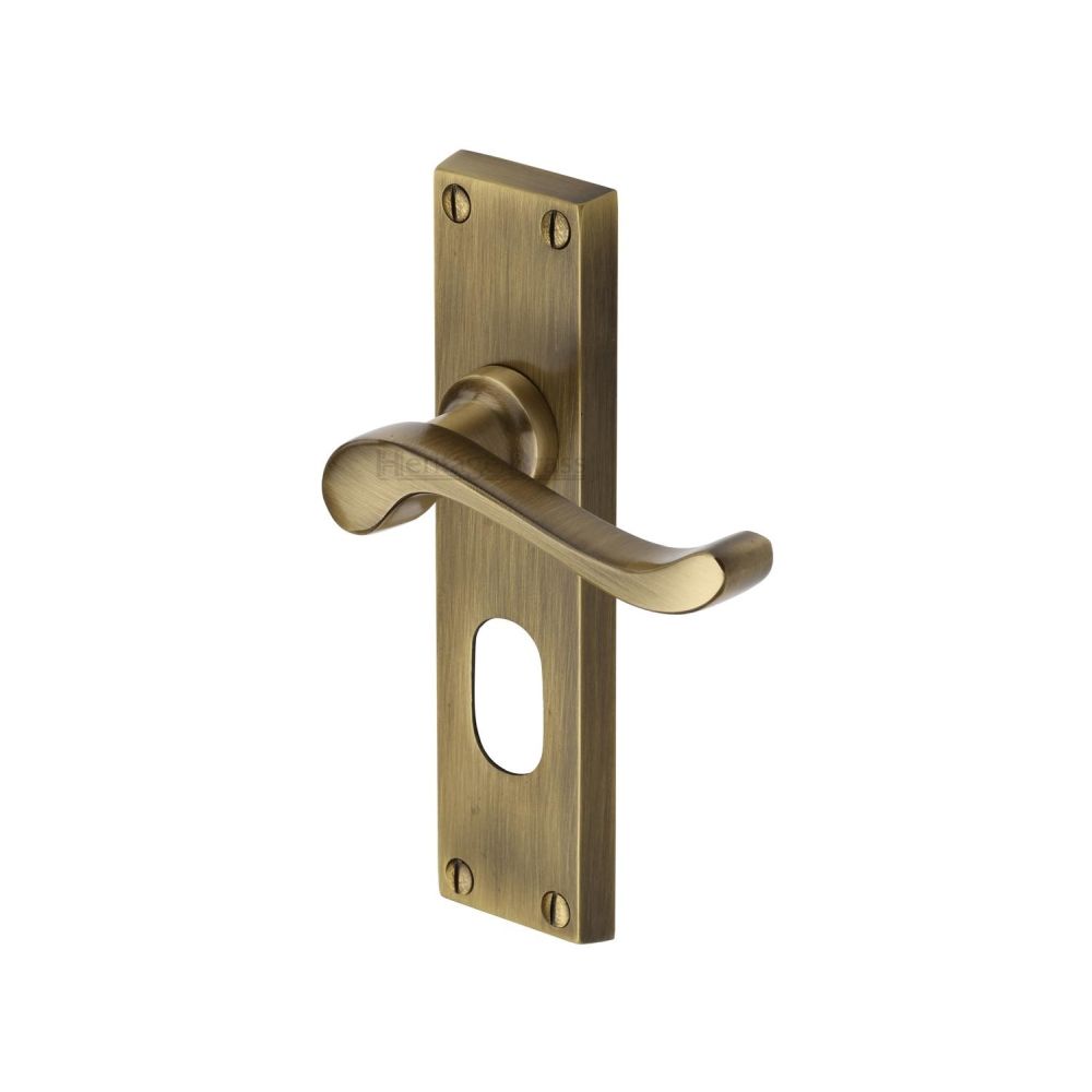 This is an image of a Heritage Brass - Door Handle for Oval Profile Plate Bedford Design Antique Brass Fi, v805-at that is available to order from T.H Wiggans Ironmongery in Kendal.