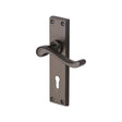 This is an image of a Heritage Brass - Door Handle Lever Lock Bedford Design Matt Bronze Finish, v810-mb that is available to order from T.H Wiggans Ironmongery in Kendal.