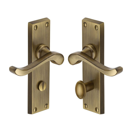 This is an image of a Heritage Brass - Door Handle for Bathroom Bedford Design Antique Brass Finish, v815-at that is available to order from T.H Wiggans Ironmongery in Kendal.