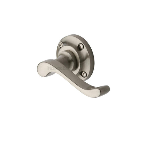 This is an image of a Heritage Brass - Door Handle Lever Latch on 57mm Round Rose Bedford Design Satin, v820-sn that is available to order from T.H Wiggans Ironmongery in Kendal.