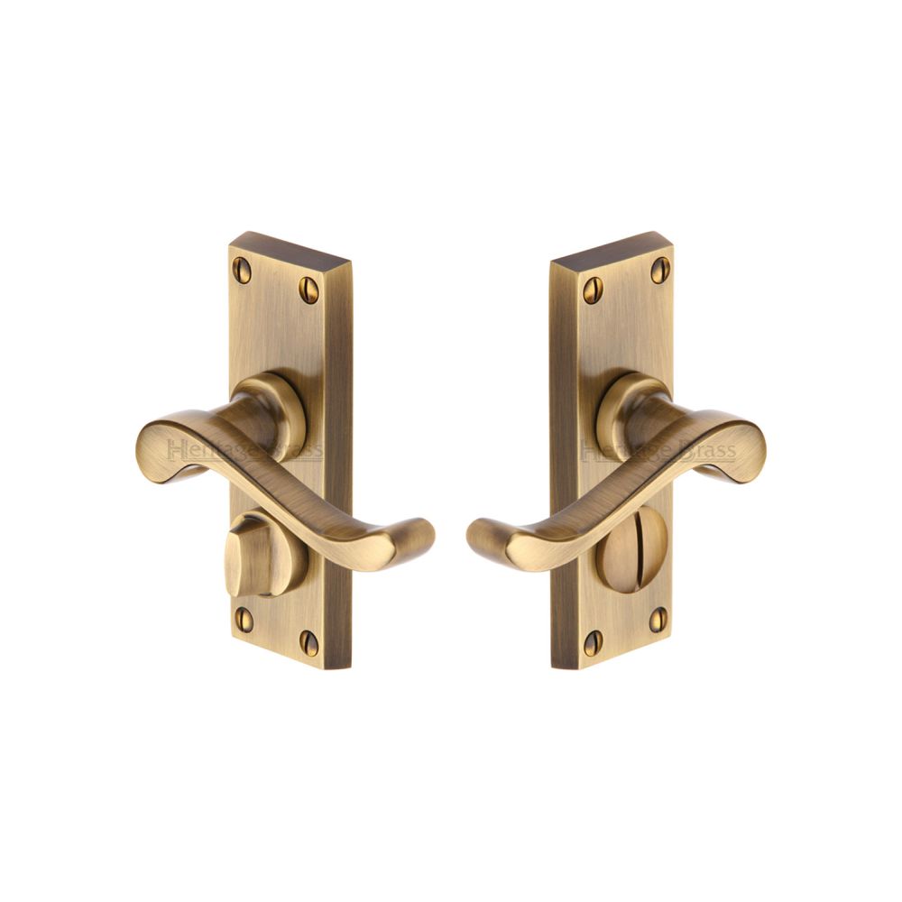 This is an image of a Heritage Brass - Door Handle for Privacy Set Bedford Short Design Antique Brass Fin, v825-at that is available to order from T.H Wiggans Ironmongery in Kendal.
