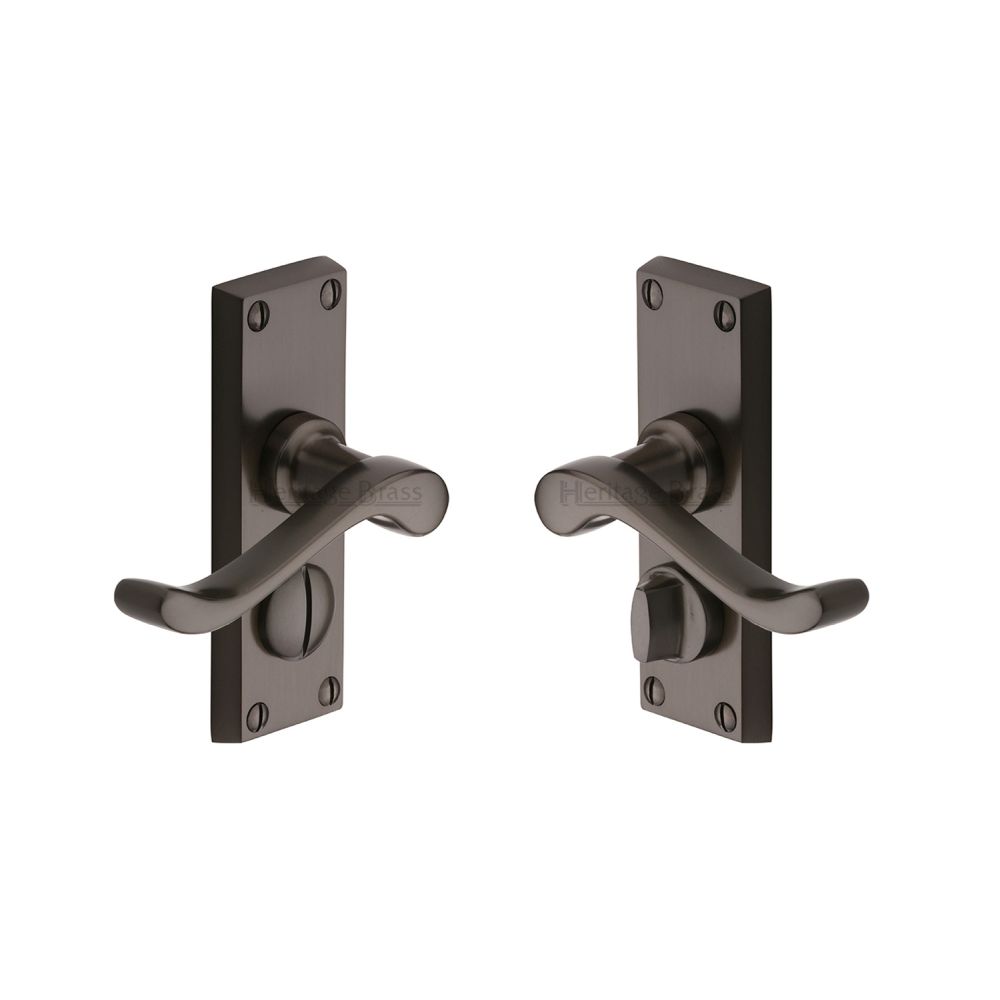 This is an image of a Heritage Brass - Door Handle for Privacy Set Bedford Short Design Matt Bronze Fi, v825-mb that is available to order from T.H Wiggans Ironmongery in Kendal.
