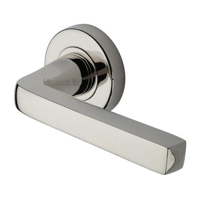 This is an image of a Heritage Brass - Alessa Door Handle on Round Rose Polished Nickel finish, v8300-pnf that is available to order from T.H Wiggans Ironmongery in Kendal.