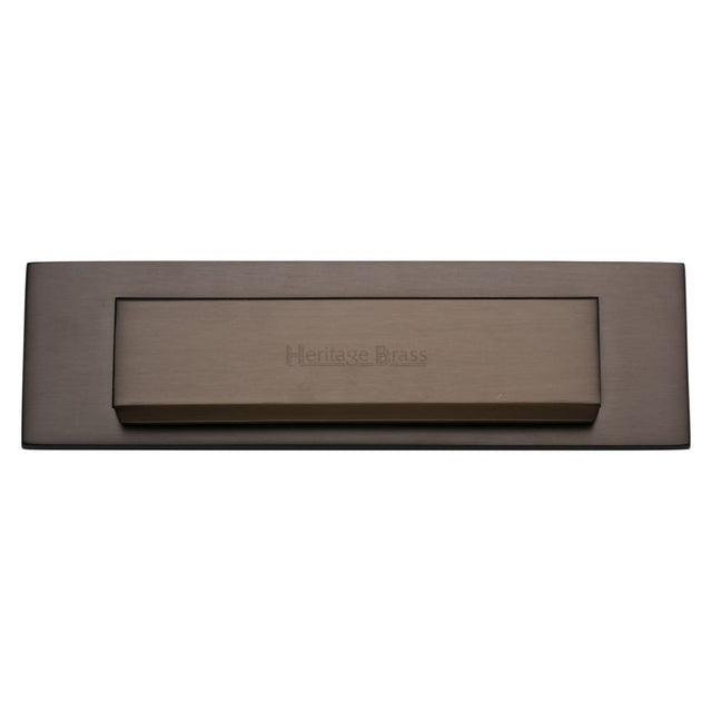 This is an image of a Heritage Brass - Gravity Letterplate 280 x 80mm - Matt Bronze Finish, v842-mb that is available to order from T.H Wiggans Ironmongery in Kendal.