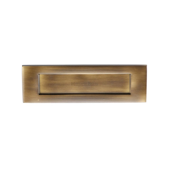 This is an image of a Heritage Brass - Letterplate 10" x 3" Antique Brass Finish, v850-254-at that is available to order from T.H Wiggans Ironmongery in Kendal.