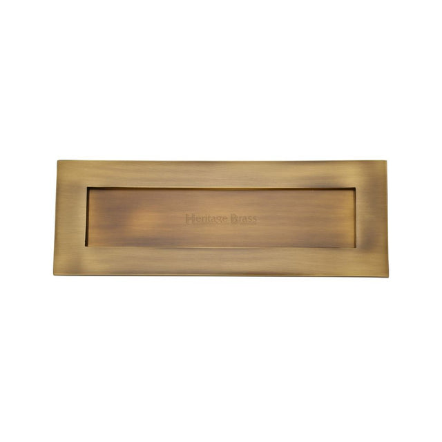 This is an image of a Heritage Brass - Letterplate 14" x 4 1/2" Antique Brass Finish, v850-356-at that is available to order from T.H Wiggans Ironmongery in Kendal.