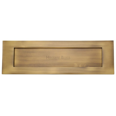 This is an image of a Heritage Brass - Letterplate 16" x 5" Antique Brass Finish, v850-406-at that is available to order from T.H Wiggans Ironmongery in Kendal.