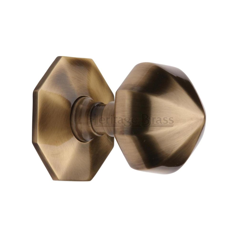 This is an image of a Heritage Brass - Octagon Centre Door Knob 2 1/2" Antique Brass Finish, v880-at that is available to order from T.H Wiggans Ironmongery in Kendal.