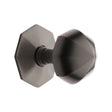 This is an image of a Heritage Brass - Octagon Centre Door Knob 2 1/2" Matt Bronze Finish, v880-mb that is available to order from T.H Wiggans Ironmongery in Kendal.