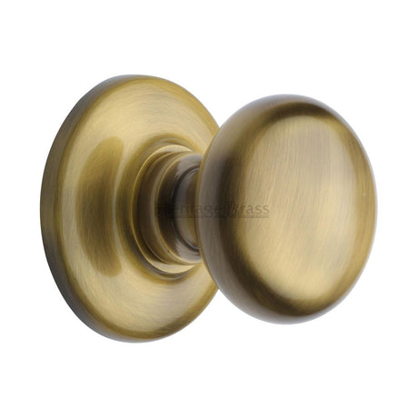 This is an image of a Heritage Brass - Centre Door Knob Round Design 3" Antique Brass Finish, v901-at that is available to order from T.H Wiggans Ironmongery in Kendal.