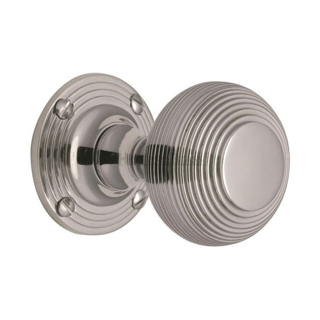 This is an image of a Heritage Brass - Mortice Knob on Rose Reeded Design Polished Chrome Finish, v971-pc that is available to order from T.H Wiggans Ironmongery in Kendal.