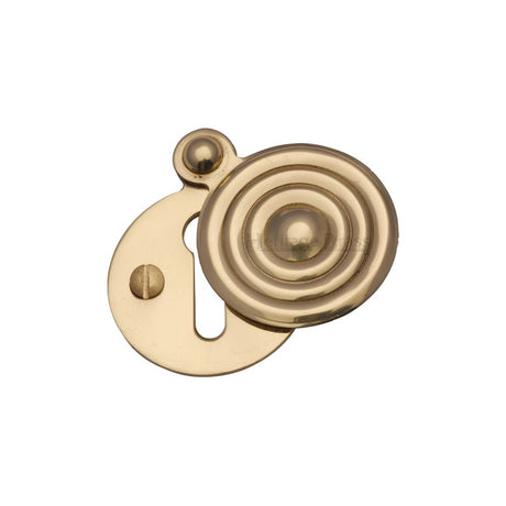 This is an image of a Heritage Brass - Covered Keyhole Reeded Polished Brass Finish, v972-pb that is available to order from T.H Wiggans Ironmongery in Kendal.