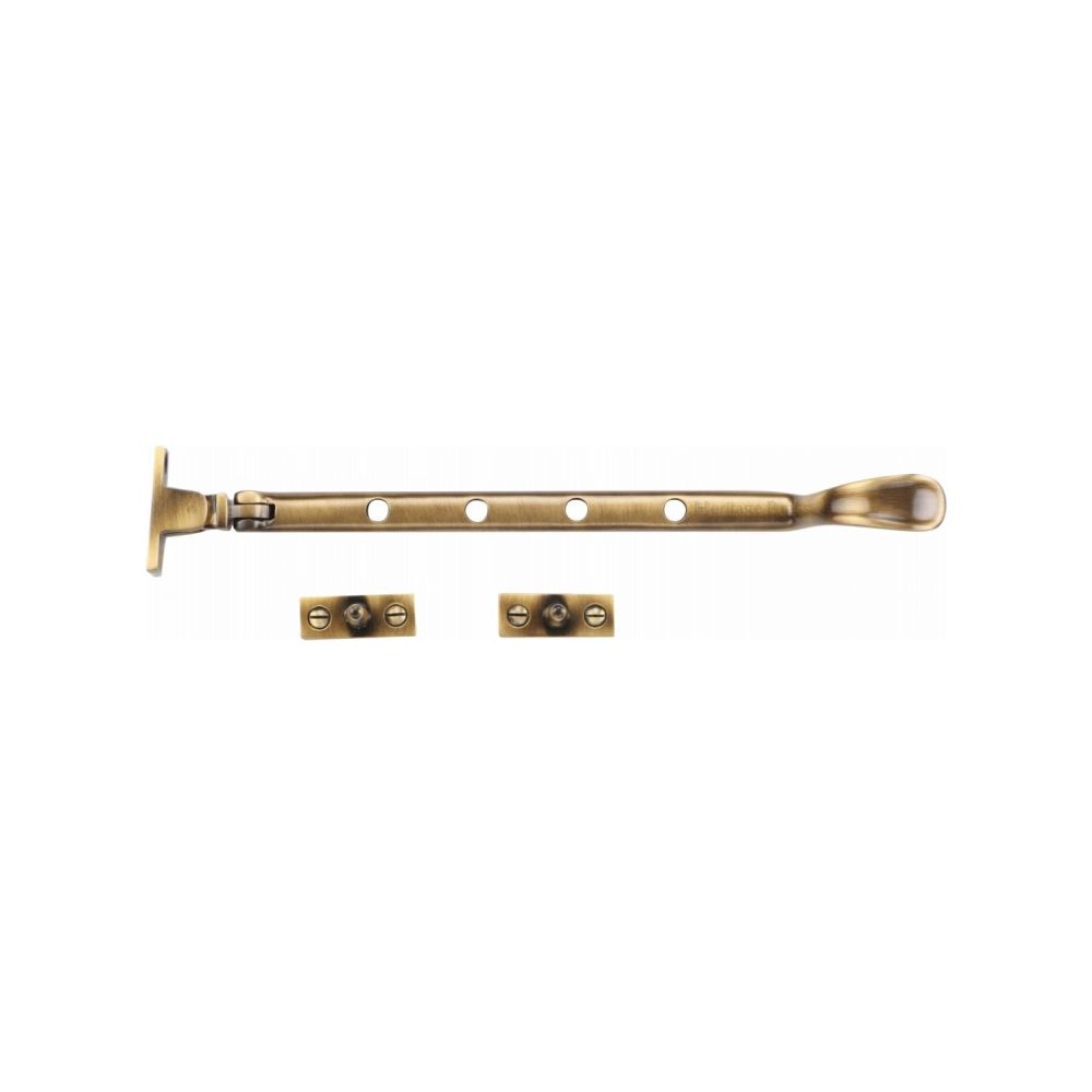 This is an image of a Heritage Brass - Casement Window Stay Spoon Pattern 10" Antique Brass Finish, v990-10-at that is available to order from T.H Wiggans Ironmongery in Kendal.