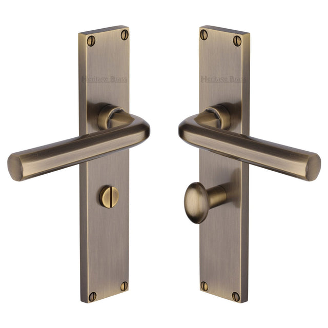 This is an image of a Heritage Brass - Octave Bathroom Set Door Handle on 200mm Plate Antique Brass finish, vt5930-at that is available to order from T.H Wiggans Ironmongery in Kendal.