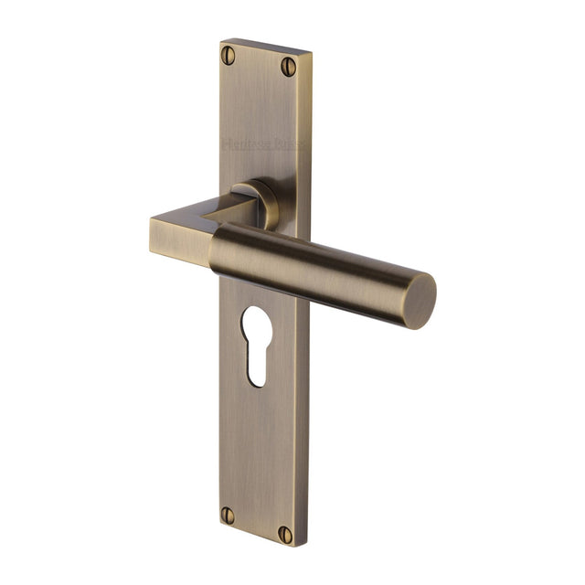 This is an image of a Heritage Brass - Bauhaus Euro Profile Door Handle on 200mm Plate Antique Brass finish, vt6348-at that is available to order from T.H Wiggans Ironmongery in Kendal.