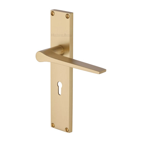 This is an image of a Heritage Brass - Gio Lever Lock Door Handle on 200mm Plate Satin Brass finish, vt8100-sb that is available to order from T.H Wiggans Ironmongery in Kendal.