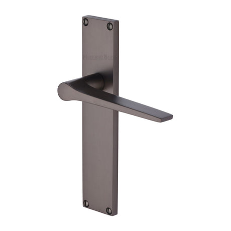 This is an image of a Heritage Brass - Gio Lever Latch Door Handle on 200mm Plate Matt Bronze finish, vt8110-mb that is available to order from T.H Wiggans Ironmongery in Kendal.