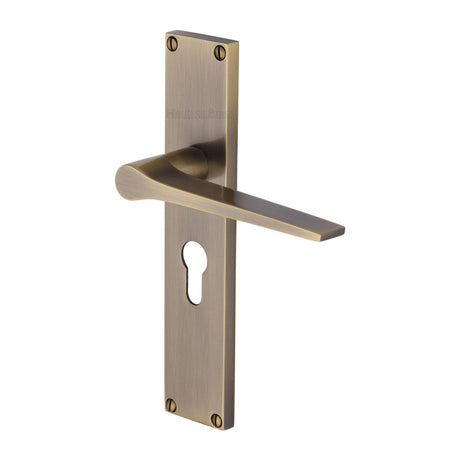 This is an image of a Heritage Brass - Gio Euro Profile Door Handle on 200mm Plate Antique Brass finish, vt8148-at that is available to order from T.H Wiggans Ironmongery in Kendal.