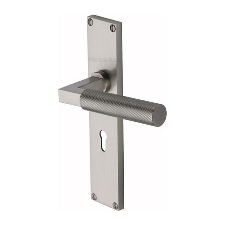 This is an image of a Heritage Brass - Bauhaus Knurled Lever Lock Door Handle on 200mm Plate Satin Nickel finish, vt9300-sn that is available to order from T.H Wiggans Ironmongery in Kendal.