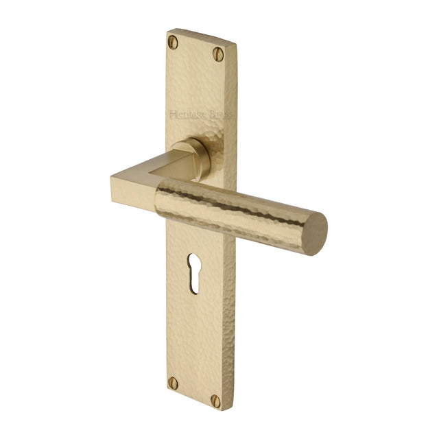 This is an image of a Heritage Brass - Bauhaus Hammered Lever Lock Door Handle on 200mm Plate Satin Brass finish, vth4300-sb that is available to order from T.H Wiggans Ironmongery in Kendal.