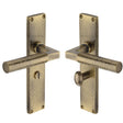 This is an image of a Heritage Brass - Bauhaus Hammered Bathroom Set Door Handle on 200mm Plate Antique Brass finish, vth4330-at that is available to order from T.H Wiggans Ironmongery in Kendal.
