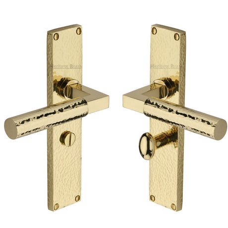 This is an image of a Heritage Brass - Bauhaus Hammered Bathroom Set Door Handle on 200mm Plate Polished Brass finish, vth4330-pb that is available to order from T.H Wiggans Ironmongery in Kendal.