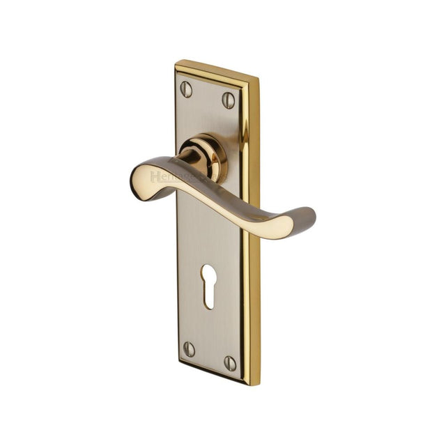 This is an image of a Heritage Brass - Door Handle Lever Lock Edwardian Design Jupiter Finish, w3200-jp that is available to order from T.H Wiggans Ironmongery in Kendal.