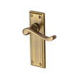 This is an image of a Heritage Brass - Door Handle Lever Latch Edwardian Design Antique Brass Finish, w3213-at that is available to order from T.H Wiggans Ironmongery in Kendal.