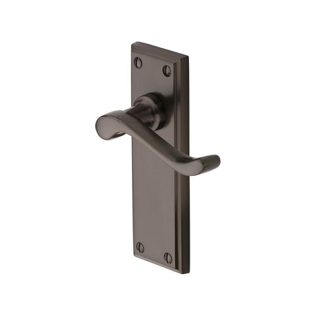 This is an image of a Heritage Brass - Door Handle Lever Latch Edwardian Design Matt Bronze Finish, w3213-mb that is available to order from T.H Wiggans Ironmongery in Kendal.