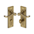 This is an image of a Heritage Brass - Door Handle for Bathroom Edwardian Design Antique Brass Finish, w3220-at that is available to order from T.H Wiggans Ironmongery in Kendal.