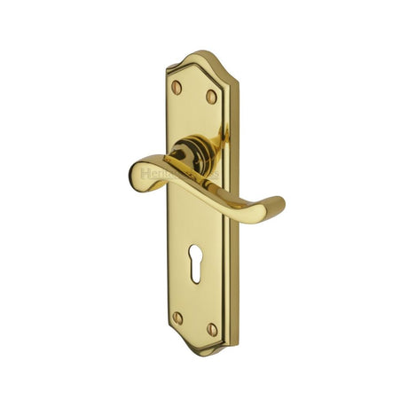 This is an image of a Heritage Brass - Door Handle Lever Lock Buckingham Design Polished Brass Finish, w4200-pb that is available to order from T.H Wiggans Ironmongery in Kendal.