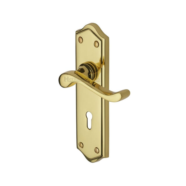 This is an image of a Heritage Brass - Door Handle Lever Lock Buckingham Design Polished Brass Finish, w4200-pb that is available to order from T.H Wiggans Ironmongery in Kendal.