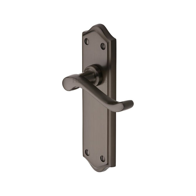 This is an image of a Heritage Brass - Door Handle Lever Latch Buckingham Design Matt Bronze Finish, w4210-mb that is available to order from T.H Wiggans Ironmongery in Kendal.