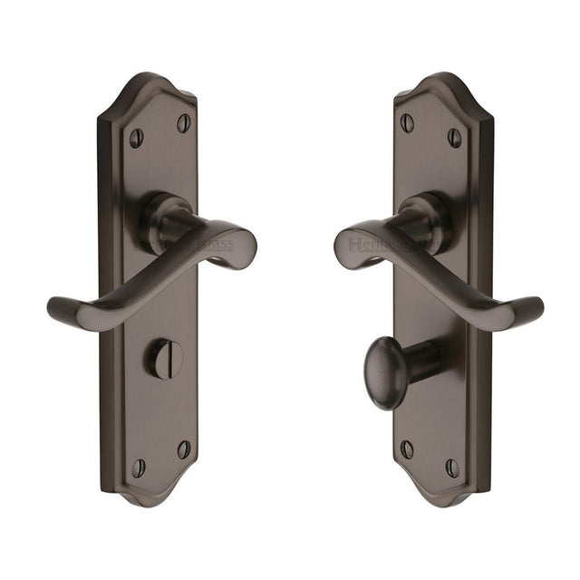 This is an image of a Heritage Brass - Door Handle for Bathroom Buckingham Design Matt Bronze Finish, w4220-mb that is available to order from T.H Wiggans Ironmongery in Kendal.