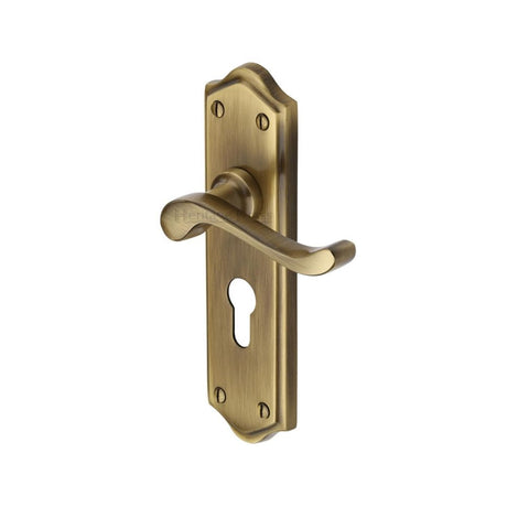 This is an image of a Heritage Brass - Door Handle for Euro Profile Plate Buckingham Design Antique Brass, w4248-at that is available to order from T.H Wiggans Ironmongery in Kendal.