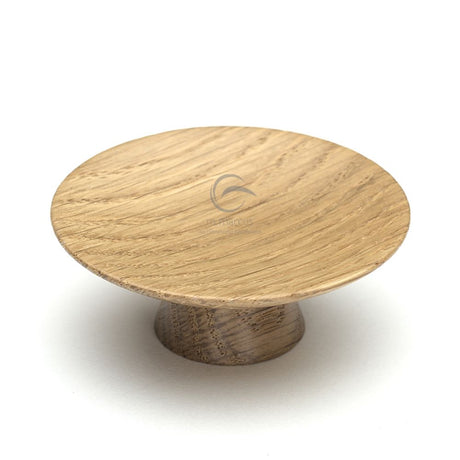 This is an image of a M.Marcus - Wooden Cabinet Knob Convex Design 65mm Oak Finish, w4343-65-oak that is available to order from T.H Wiggans Ironmongery in Kendal.