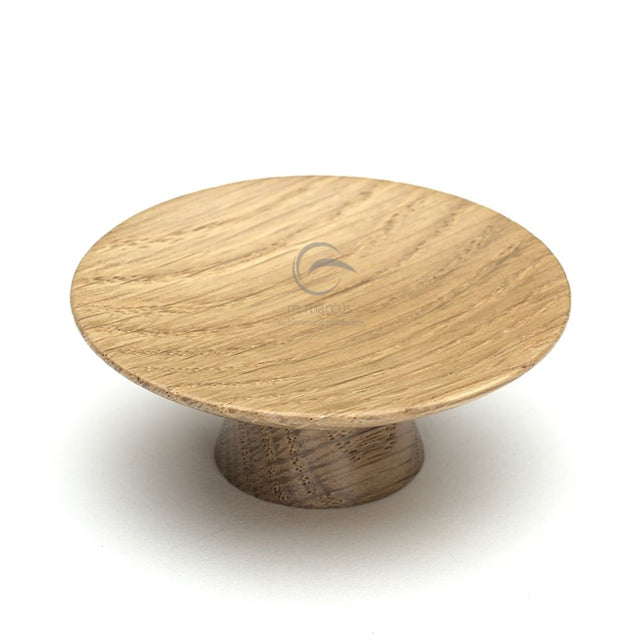 This is an image of a M.Marcus - Wooden Cabinet Knob Convex Design 65mm Oak Finish, w4343-65-oak that is available to order from T.H Wiggans Ironmongery in Kendal.