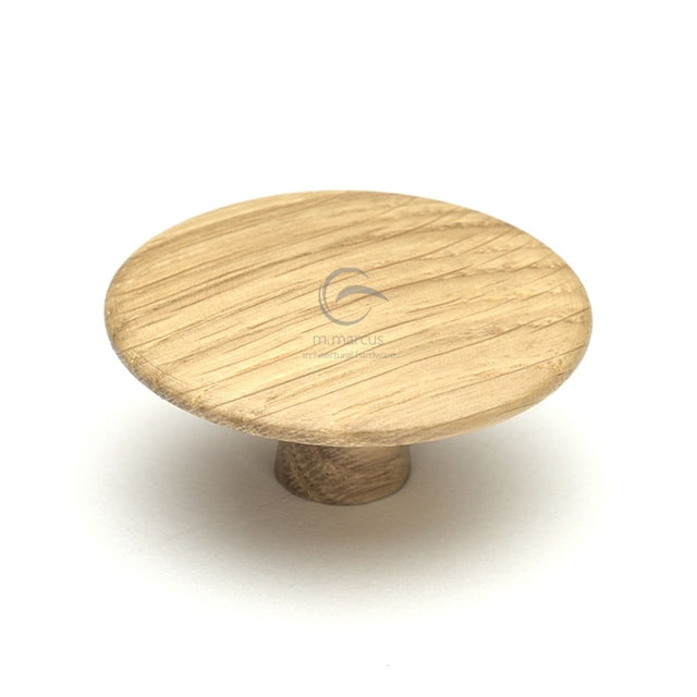 This is an image of a M.Marcus - Wooden Cabinet Knob Mushroom Design 48mm Oak Finish, w4466-48-oak that is available to order from T.H Wiggans Ironmongery in Kendal.