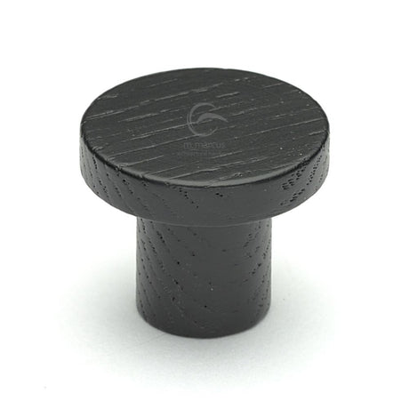 This is an image of a M.Marcus - Wooden Cabinet Knob Round Circum Design 33mm Black Ash Finish, w4470-33-ash that is available to order from T.H Wiggans Ironmongery in Kendal.