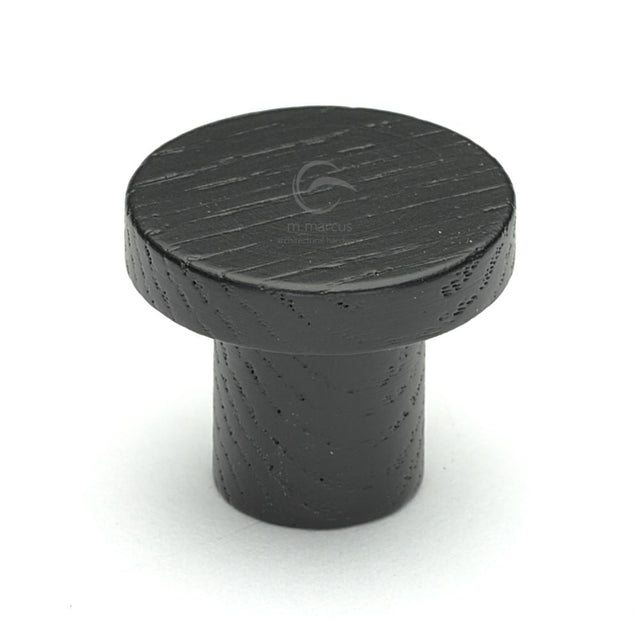 This is an image of a M.Marcus - Wooden Cabinet Knob Round Circum Design 33mm Black Ash Finish, w4470-33-ash that is available to order from T.H Wiggans Ironmongery in Kendal.