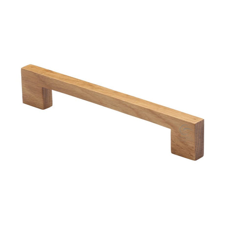 This is an image of a M.Marcus - Wooden Cabinet Pull Handle Metro Design 160mm Oak Finish, w7490-160-oak that is available to order from T.H Wiggans Ironmongery in Kendal.