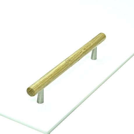 This is an image of a M.Marcus - Wooden Cabinet Pull Handle T-Bar Tilaa Design 160mm Oak Finish, w7763-160-oak that is available to order from T.H Wiggans Ironmongery in Kendal.