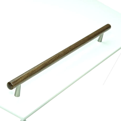This is an image of a M.Marcus - Wooden Cabinet Pull Handle T-Bar Tilaa Design 320mm Walnut Finish, w7763-320-wal that is available to order from T.H Wiggans Ironmongery in Kendal.