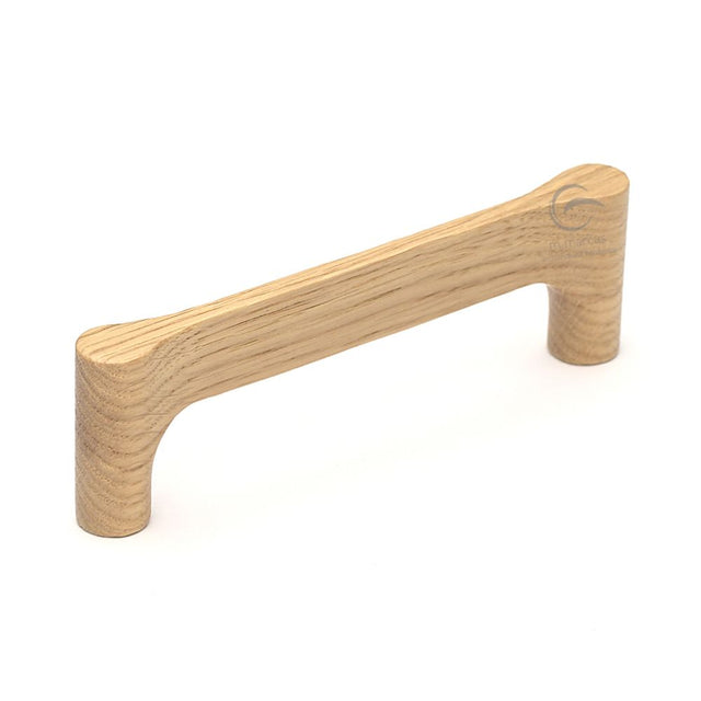 This is an image of a M.Marcus - Wooden Cabinet Pull Handle Gio Design 128mm Oak Finish, w7827-128-oak that is available to order from T.H Wiggans Ironmongery in Kendal.
