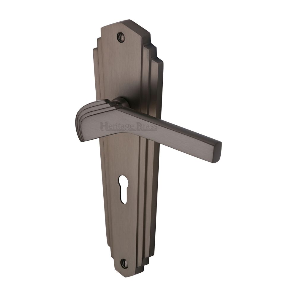 This is an image of a Heritage Brass - Door Handle Lever Lock Waldorf Design Matt Bronze Finish, wal6500-mb that is available to order from T.H Wiggans Ironmongery in Kendal.
