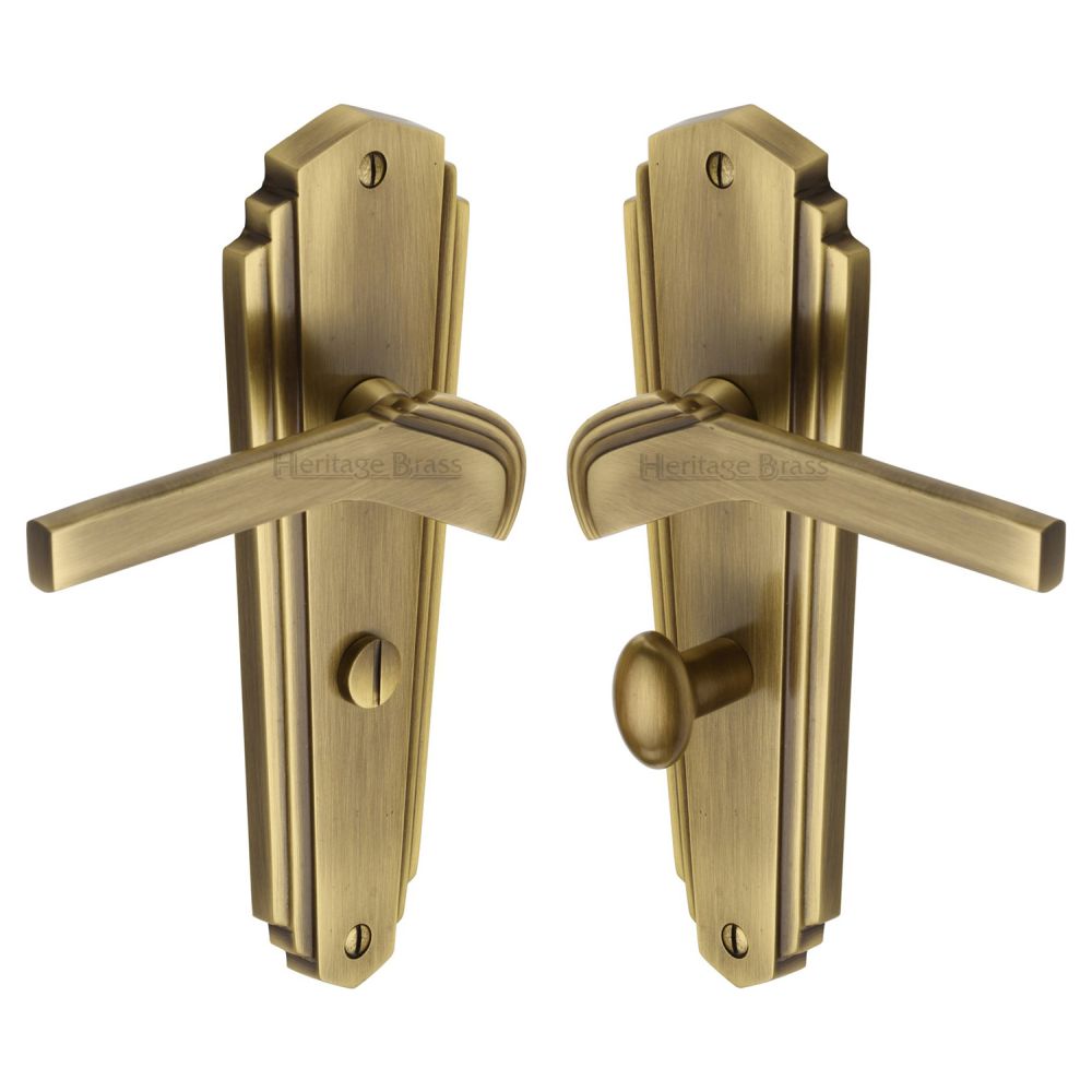 This is an image of a Heritage Brass - Door Handle for Bathroom Waldorf Design Antique Brass Finish, wal6530-at that is available to order from T.H Wiggans Ironmongery in Kendal.