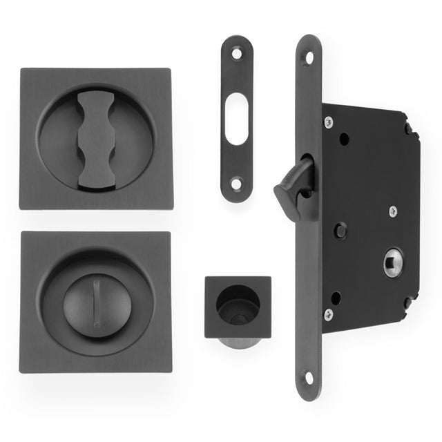 This is an image of Alexander & Wilks - Sliding Door Lock Set - Square Roses - Radius Forend & Strike-Dark Bronze PVD AW111RDBZPVD available to order from T.H. Wiggans Ironmongery in Kendal, quick delivery and discounted prices.